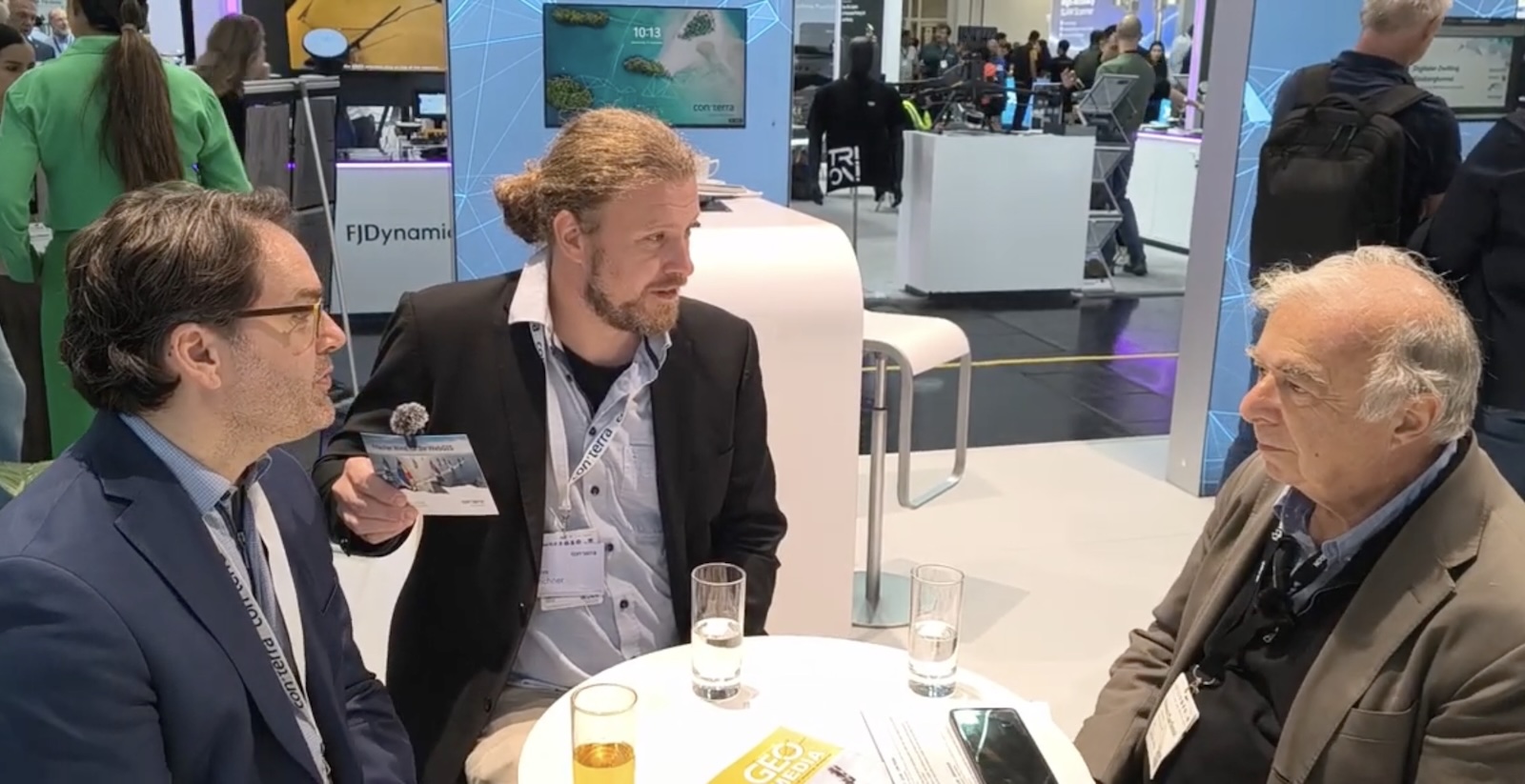 Renzo Carlucci of GEOmedia with Toro Fechner and Mark Lehmann of CON TERRA at INTERGEO 2026 in Munich